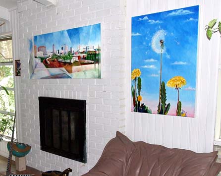 paintings on fireplace wall